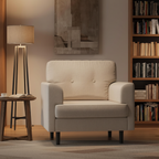 Beige linen accent armchair in warm reading nook with floor lamp and bookshelf